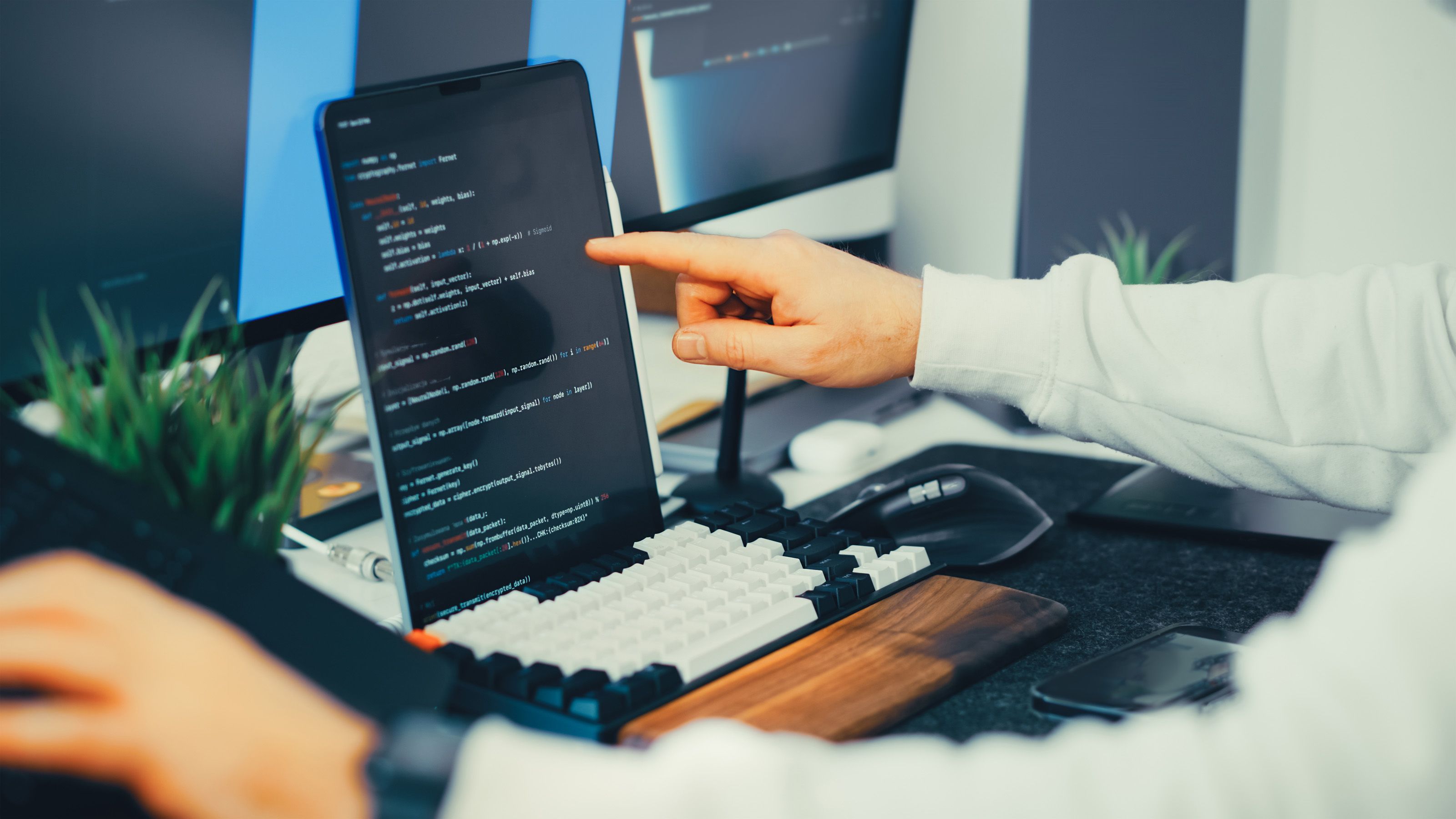 Developer workstation with code on a screen